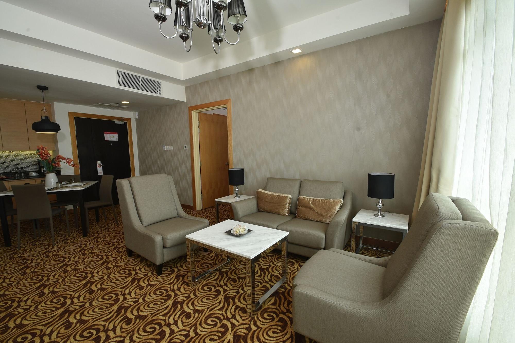 Tenera Hotel Банги Екстериор снимка A living room in a suite at the hotel